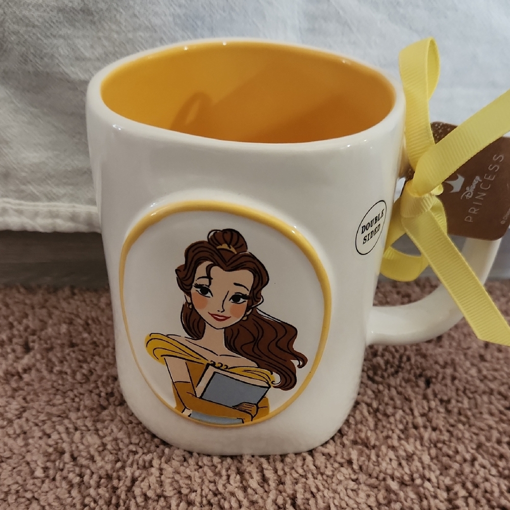 Rae Dunn White Ceramic Mug with Yellow Interior and Belle Illustration